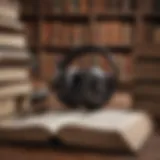 A person immersed in listening to an audio biography, surrounded by books and a notebook.