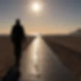 Embarking on the Journey Silhouette of a lone figure against a vast horizon