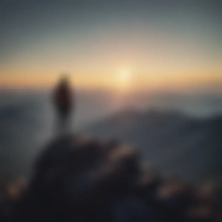 A silhouette of a person standing on a mountain peak, looking at the horizon