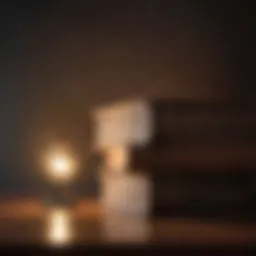 A stack of influential books with a glowing light illuminating them