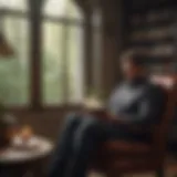 A thoughtful man reading a book in a cozy setting